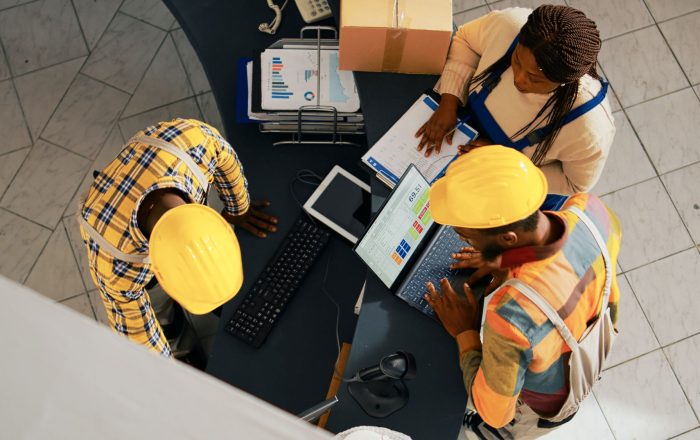 african-american-people-looking-supplies-list-pc-working-with-computer-check-inventory-logistics-employees-organizing-merchandise-shelves-warehouse-space-handheld-shot